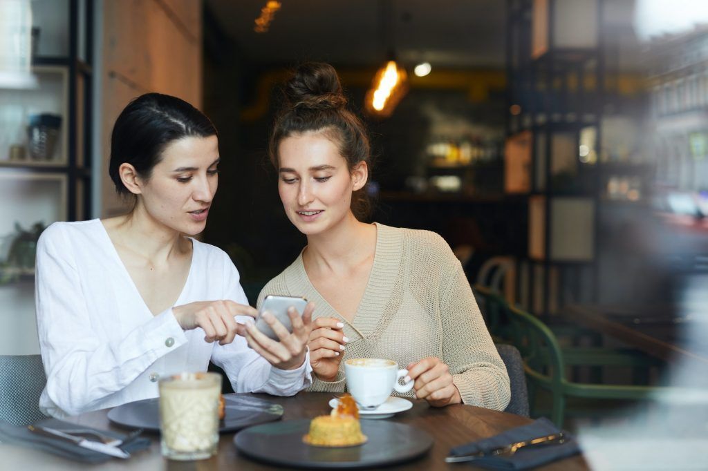 Girls discussing promo